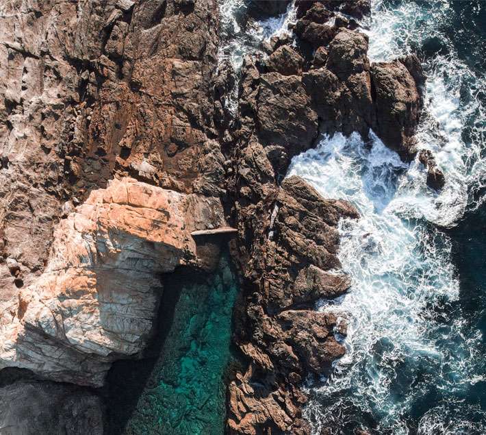 Waves breaking on the rocks